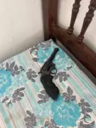 Arma Escondida Sob Travesseiro: Polícia Encontra Revolver em Residência de Governador Valadares