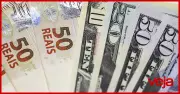 Dólar cai a menor nível em 17 meses: R$ 5,27 com alívio interno e externo