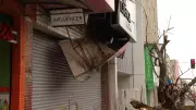 Árvore desaba e destrói fachada de loja no centro de Montes Claros; veja o vídeo impressionante