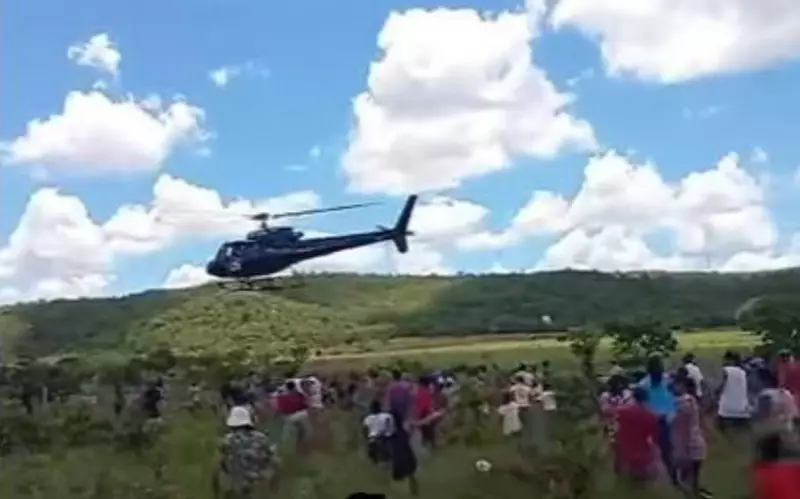 Helicóptero joga carne para moradores em Aparecida de Goiânia em ação solidária