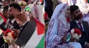 54 casais celebram casamento coletivo em Gaza em meio a escombros