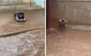 Motorista é resgatado de carro ilhado na Marginal Botafogo após chuva forte em Goiânia