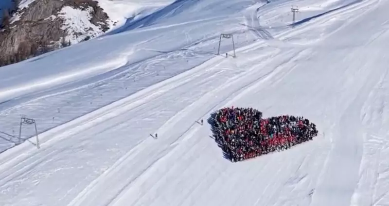 Esquiadores formam coração em homenagem às 40 vítimas de incêndio na Suíça