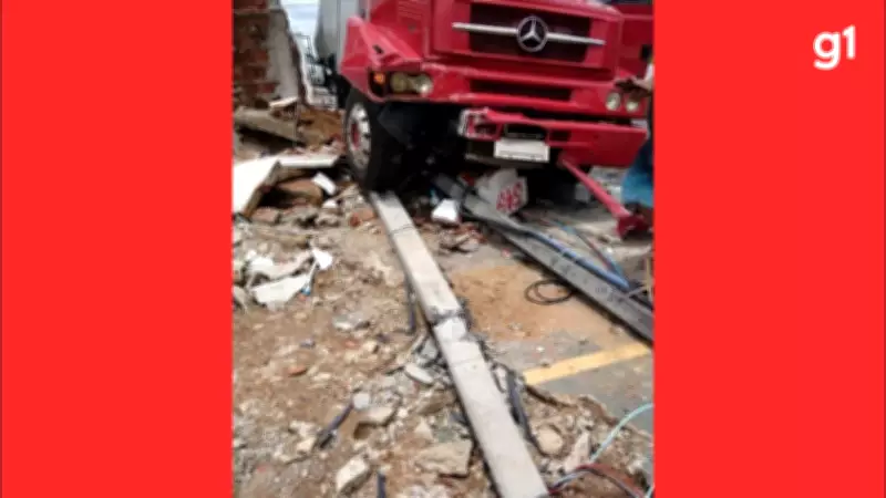 Caminhão com carga de leite bate em muro após falha no freio de mão em Taubaté