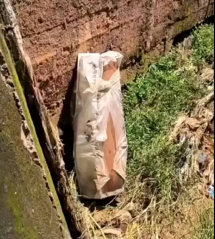 Chuva derruba muro de funerária e lança caixões em córrego em Bicas, MG