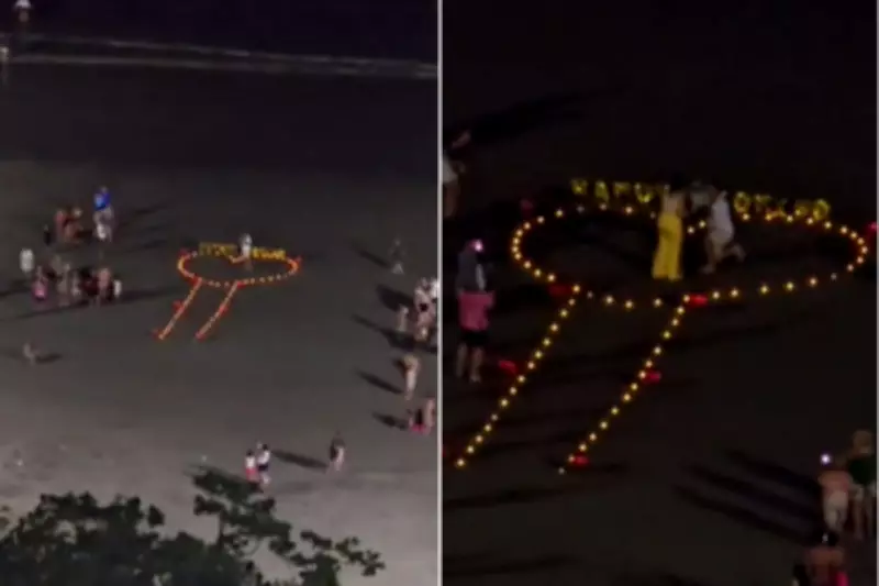 Pedido de namoro com velas em formato inusitado na praia de Santos viraliza na internet