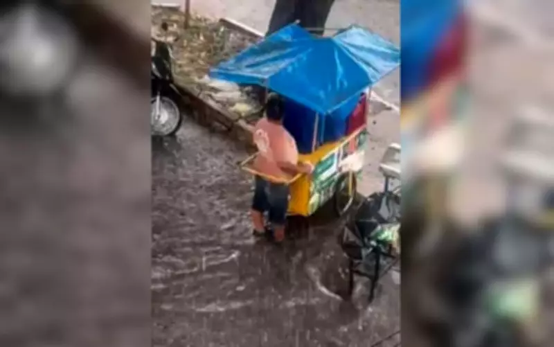 Ambulante enfrenta enxurrada em Goiânia para salvar sustento; vídeo viraliza