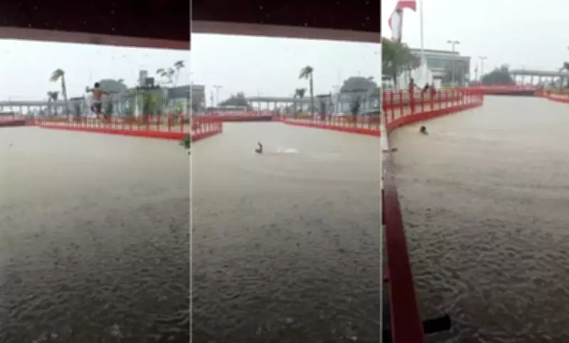 Canal da Nova Doca transborda em Belém e vira 'piscina' para crianças durante temporal