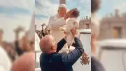 Bebê cearense recebe bênção do Papa Leão XIV após missa de Domingo de Ramos no Vaticano