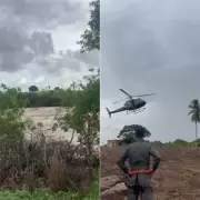 Família é resgatada de helicóptero após cheia do rio Jacu no Rio Grande do Norte