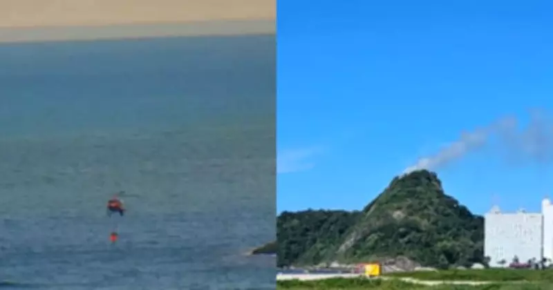 Helicóptero capta água do mar para combater incêndio no Morro do Boi, em Matinhos