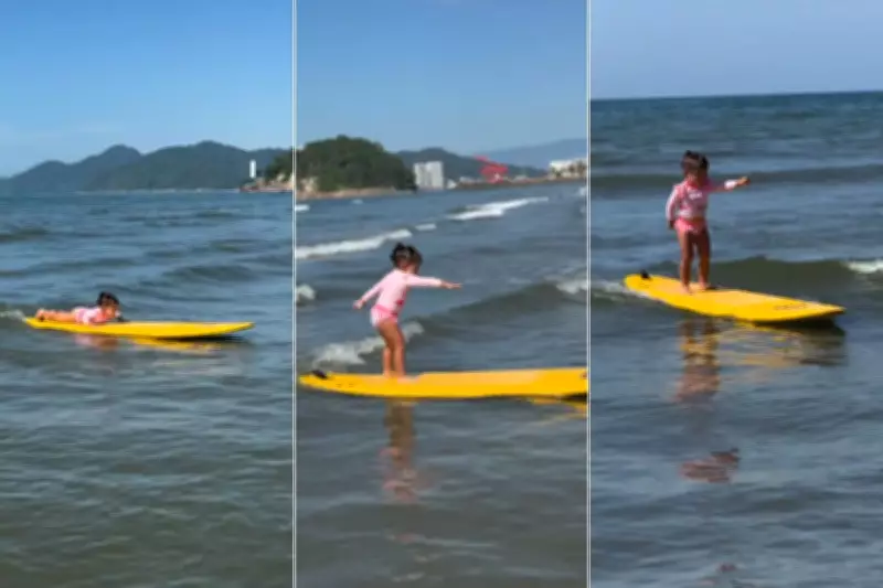 Mini surfista de 2 anos encanta ao pegar ondas em Santos e viraliza nas redes sociais