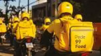 Macquarie rebaixa DiDi e alerta sobre pressão no Brasil, dona da 99