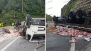Caminhão perde freios, tomba e espalha carga de argamassa na Rodovia dos Tamoios