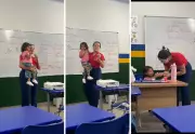Professora segura filha de aluna no colo durante aula e gesto emociona nas redes sociais
