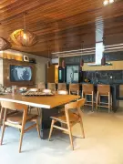 Varanda gourmet como coração da casa: integração e materiais naturais