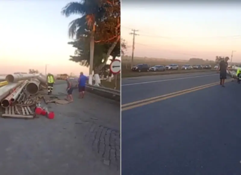 Carreta com tubos tomba e interdita BR-101 em Campos dos Goytacazes