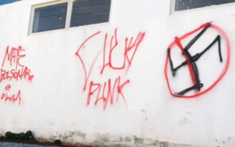 Homem de 27 anos é investigado por apologia ao nazismo após pichar imóveis em Varginha