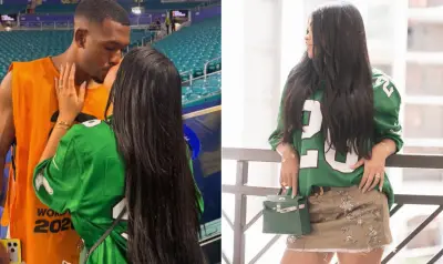Esposa de Rayan usa blusa de futebol americano e comemora com beijão