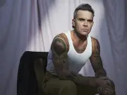 Robbie Williams: 'Sempre tive adultos cuidando de tudo. Nunca questionei'